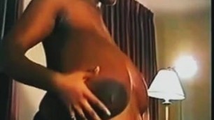 COCKED AND LOADED: HUGE PREGNANT BLACK TITS
